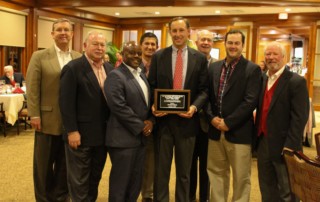 Charles Ezelle receives Dave T. Smith Award