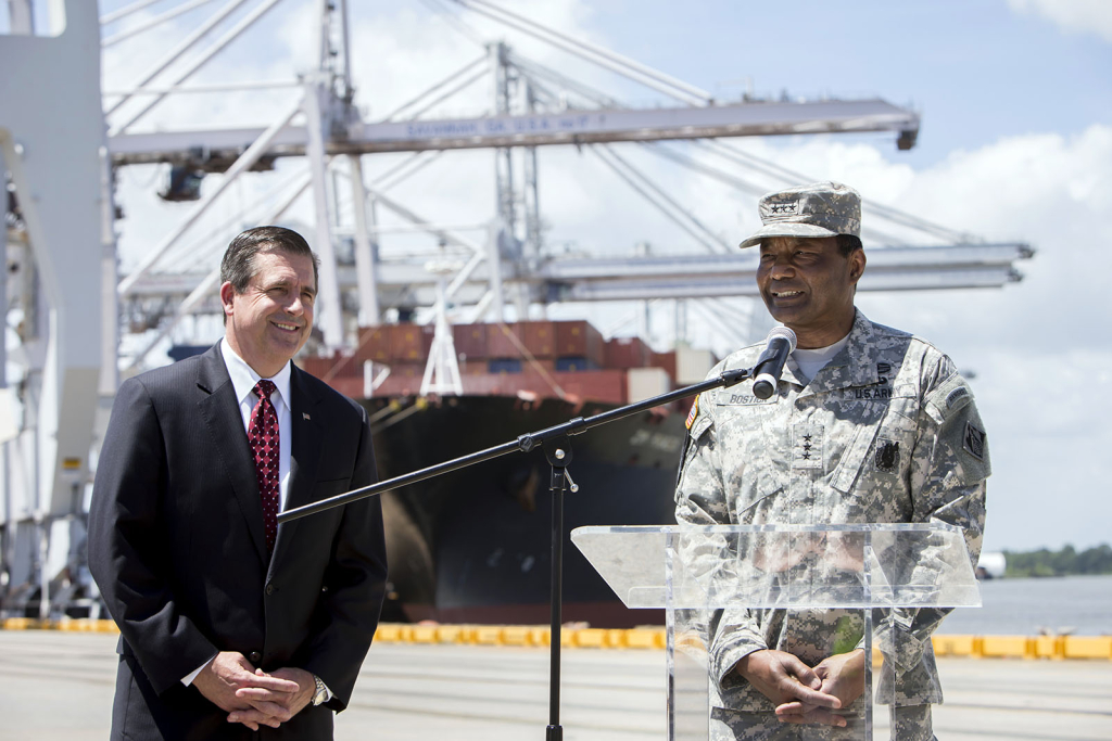 Georgia Ports Authority Executive Director Curtis Foltz, left, and Lt. General Thomas Bostick, commander of the U.S. Army Corps of Engineers, give an update on the Savannah Harbor Expansion Project as cranes work a vessel, Thursday, May 28, 2015, at the Garden City Terminal near Savannah, Ga. The harbor deepening, currently in the construction phase, will deepen the shipping channel from 42 to 47 feet at mean low water. (Georgia Ports Authority/Stephen B. Morton)