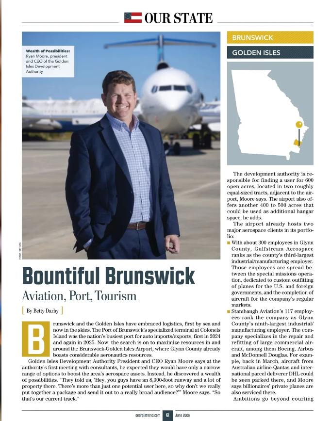 A man in a suit stands smiling in front of an airplane; an article discusses aviation, port, tourism, development, and Lucas Center entrepreneurship events in Brunswick and the Golden Isles, Georgia.